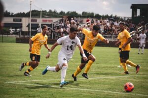 Men playing soccer