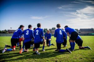 a team of soccer player in the field