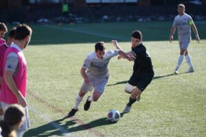 players playing soccer in the field