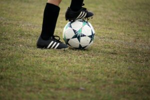 soccer player wearing cleats