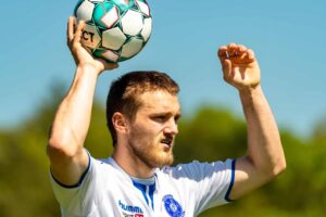 soccer player with ball