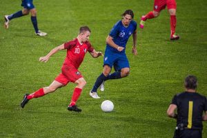 a soccer player is running